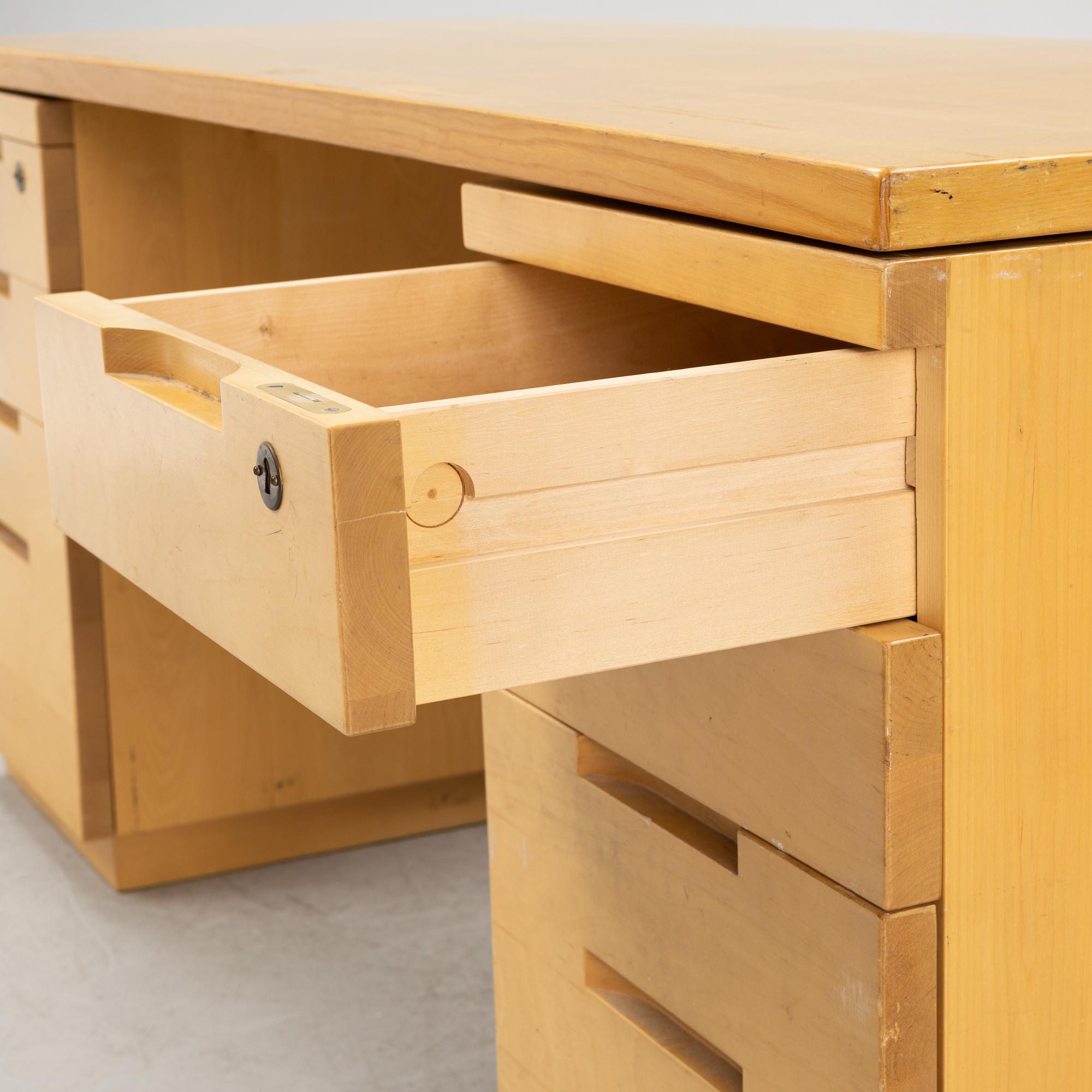 Alvar Aalto, a birch writing desk for Artek, Finland, second half of the 20th century.