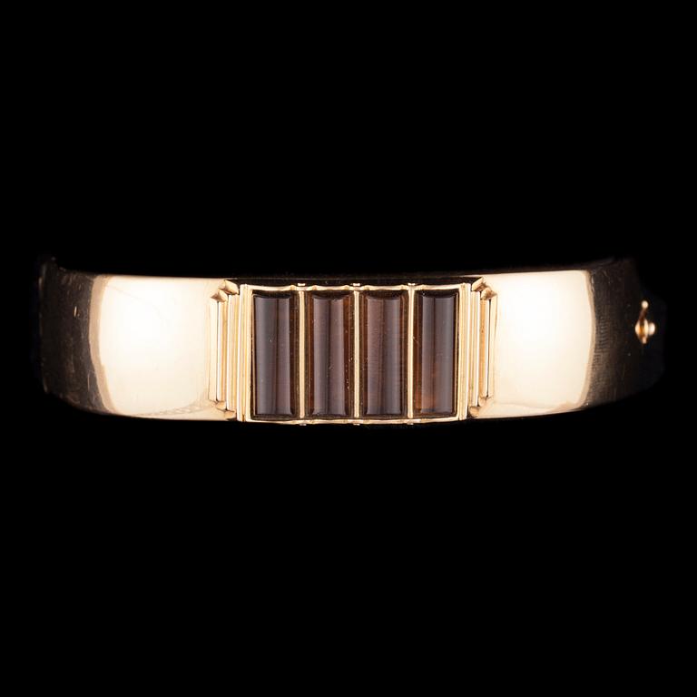 ARMBAND, 14K guld, rökkvarts. Petterson, Åbo 1963. Vikt ca 49 g.