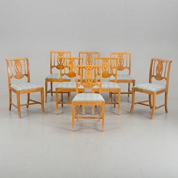 A set of 8 first half of the 20th century chairs veneered with birch.