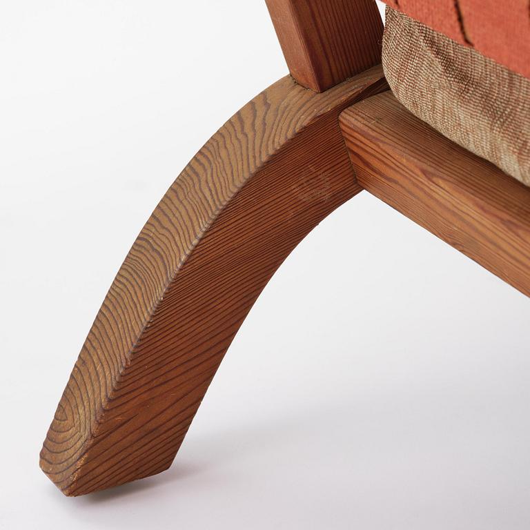 Axel Einar Hjorth, a stained pine "Väddö" easy chair, Nordiska Kompaniet, Sweden, 1930s-40s.