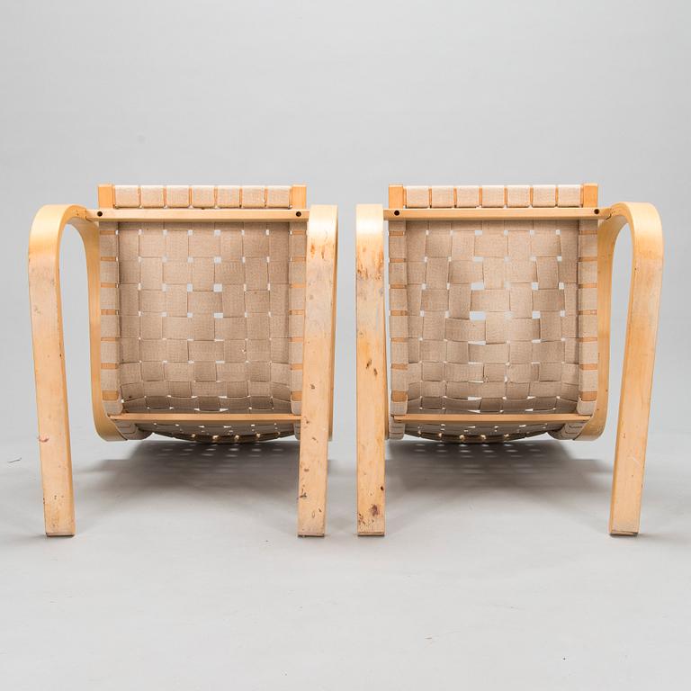 Alvar Aalto, a pair of late 1900s '406' armchairs for Artek.