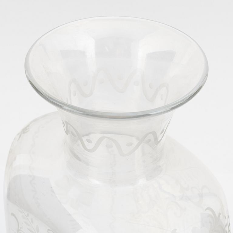 A hexagonal glass flask, 20th century.
