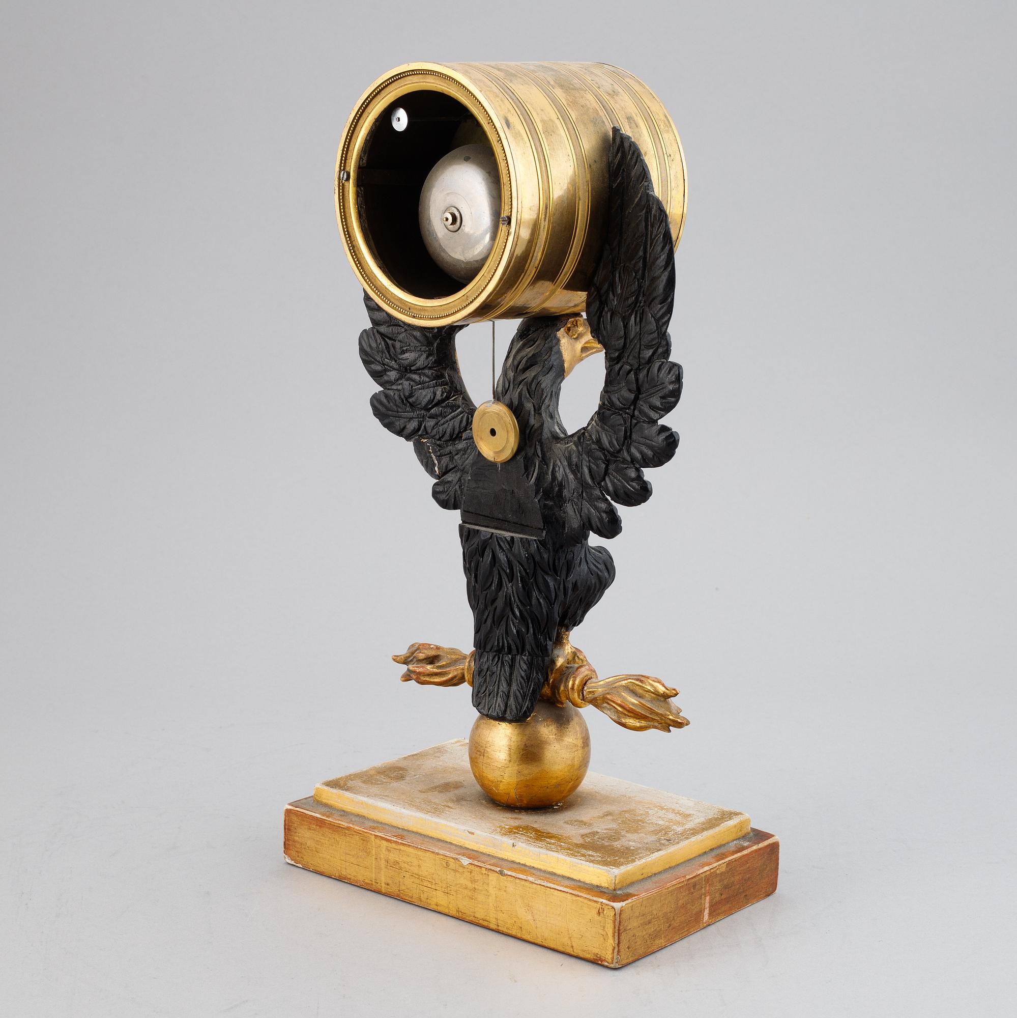 An empire mantel clock by Jacob Holmgren (Stockholm 1811-1837).
