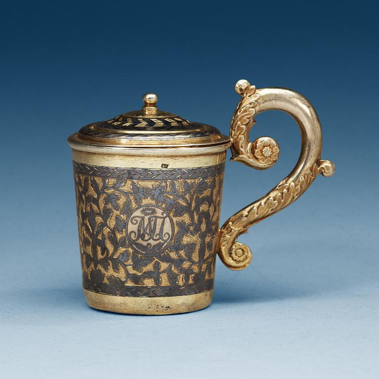 A Russian 19th century silver-gilt and niello cup and cover, unidentified makers mark, Moscow 1836.