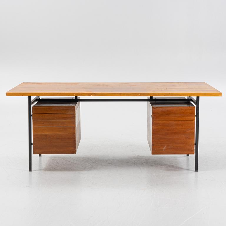 Florence Knoll, a model 590-036 walnut-veneered desk, by Nordiska Kompaniet in Sweden for Knoll International, 1962.