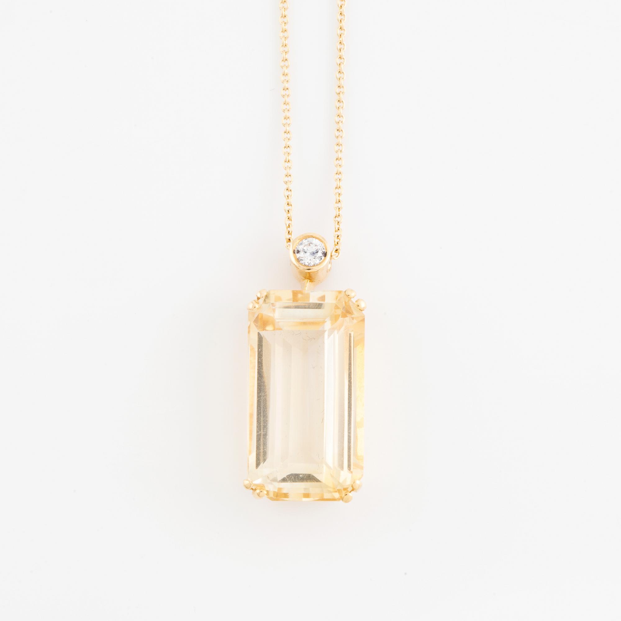 Emerald cut citrine and brilliant cut diamond necklace.