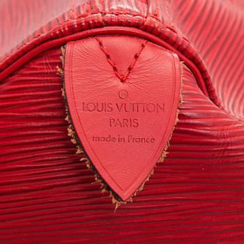 Louis Vuitton, A Red Epi Leather Keepall travel bag.