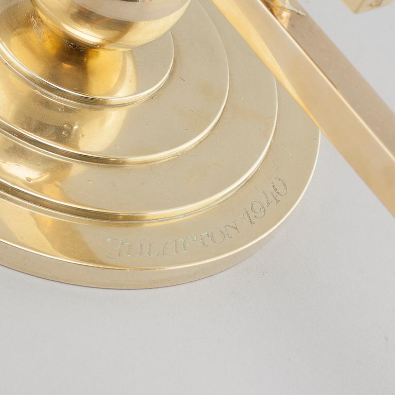 A brass candelabra, attributed to Firma Lars Holmström in Arvika, 20th cenutry.