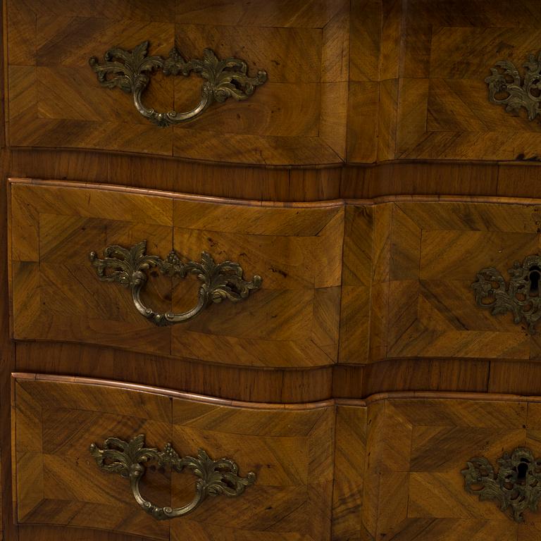 A late baroque mid 18th century chest of drawers by Christian Linning.