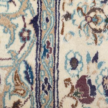 A Nain carpet, circa 310 x 196 cm.