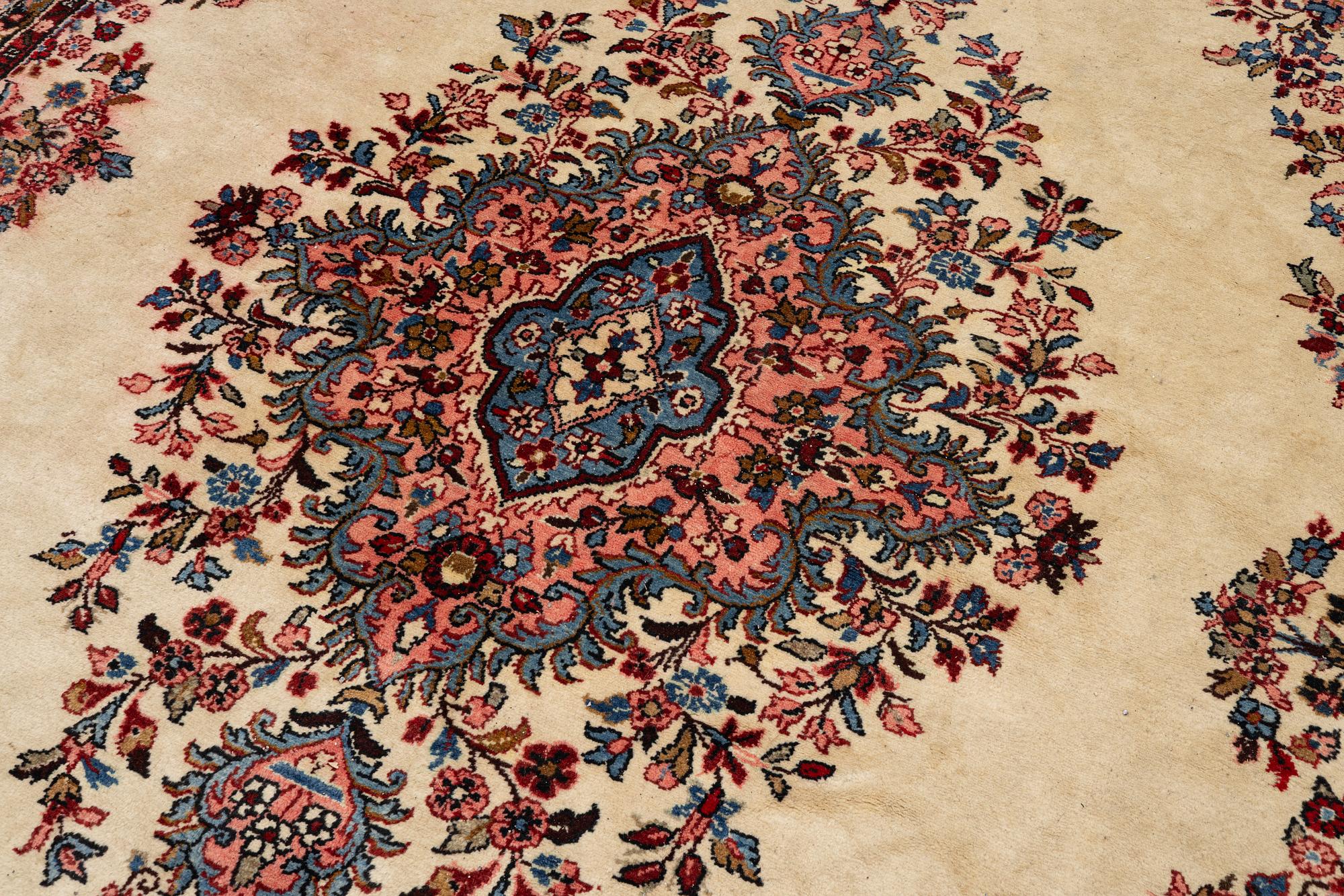 An oriental carpet, c. 370x260 cm.