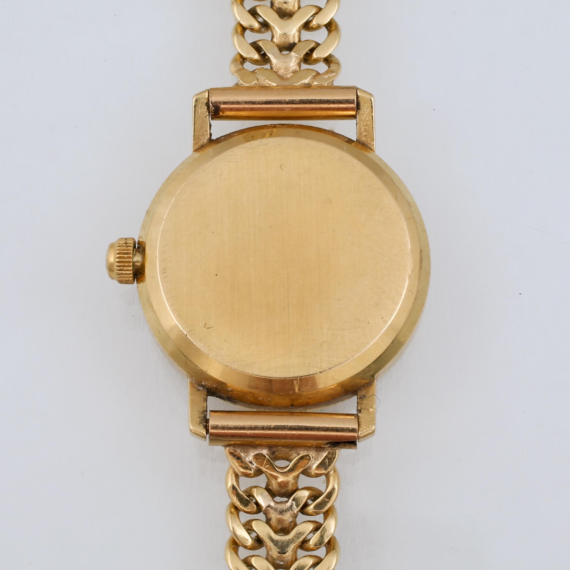ARMBANDSUR, dam, 18 k guld, total vikt 26 g.