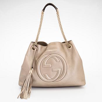 Gucci, a "Soho" leather bag.