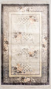 A Chinese old silk carpet ca 240x153 cm.