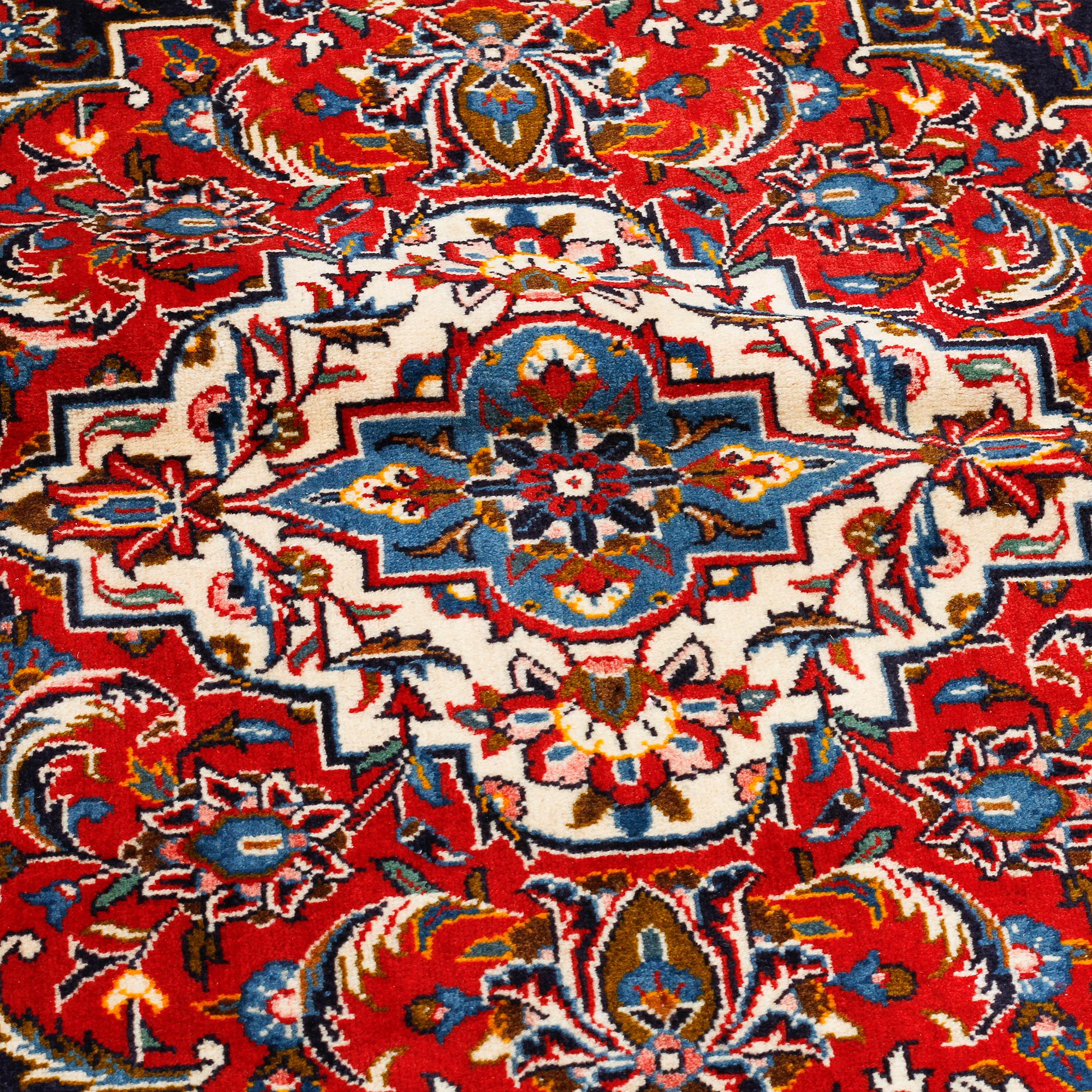 A KESHAN RUG, SIGNED, 413 x 297 cm.
