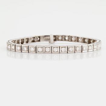 895. A BRACELET set with round brilliant-cut diamonds.