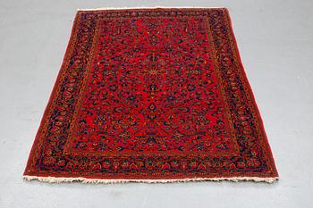 A rug, a semi-antique Kashan, ca 210 x 130,5-134 cm.