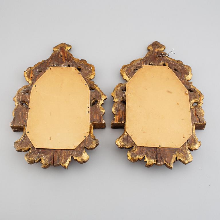 A pair of Louis XV mirrors from the 18th century.