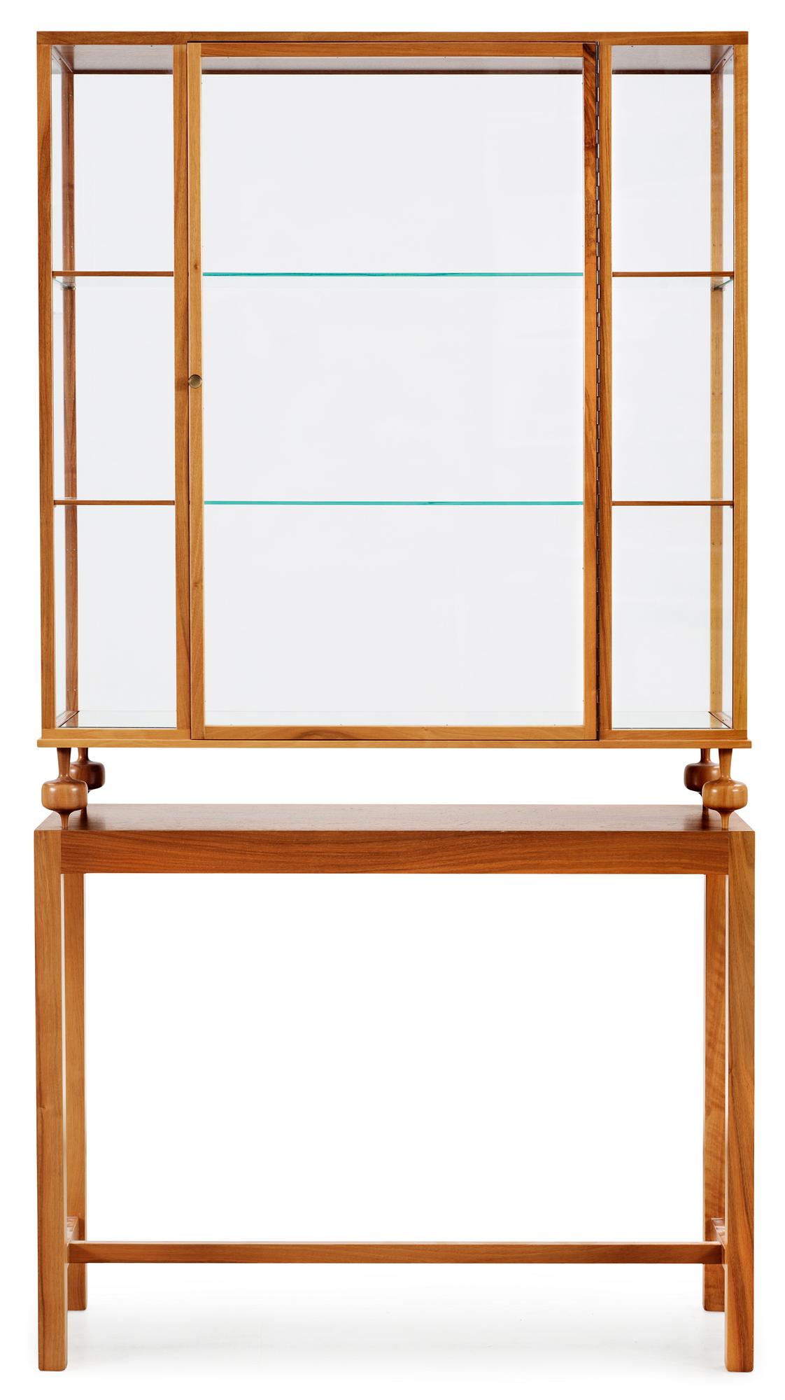 A Josef Frank walnut showcase cabinet, Svenskt Tenn, model 2077.