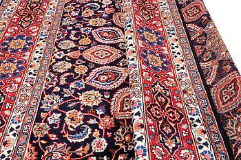 A Meshed carpet, c. 352 x 255 cm.