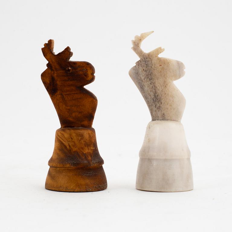 A birch and reindeer horn chessgame by Thore Sunna, before 1966, signed.