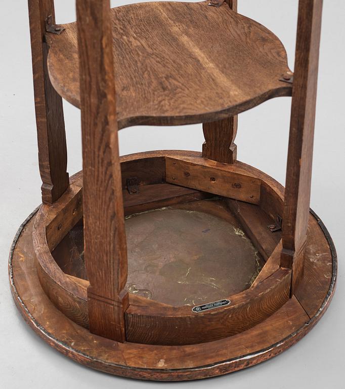 David Blomberg, attributed to, an Art Nouveau oak and copper table, Nordiska Kompaniet, Sweden early 1900's.