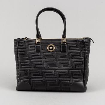 Versace, a black quilted leather handbag.