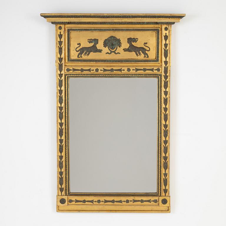 A Empire mirror from the first half of the 19th century.