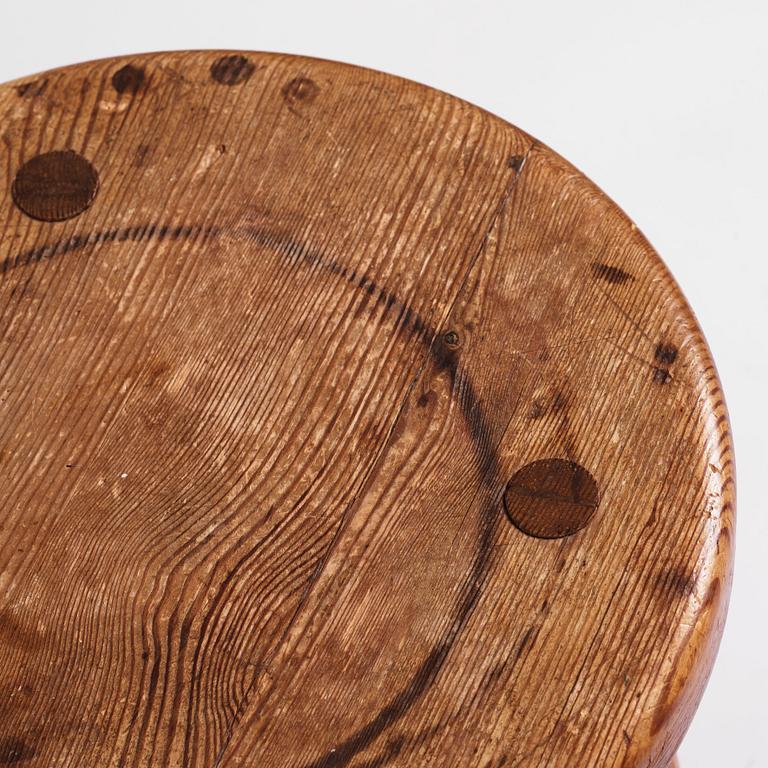 Axel Einar Hjorth, a pair of "Skoga" stained pine stools, Nordiska Kompaniet 1930s.