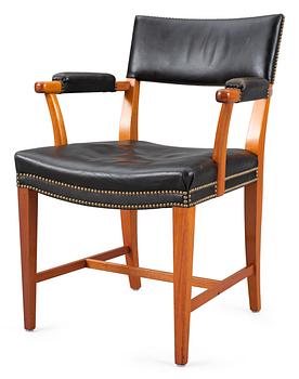 530. A Josef Frank mahogany and black leather armchair, Svenskt Tenn, model 695.