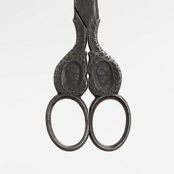 Steel scissors with the portraits of Nicholas II and Alexandra Feodorovna. Manufacturer D. Peres Solingen, Germany.