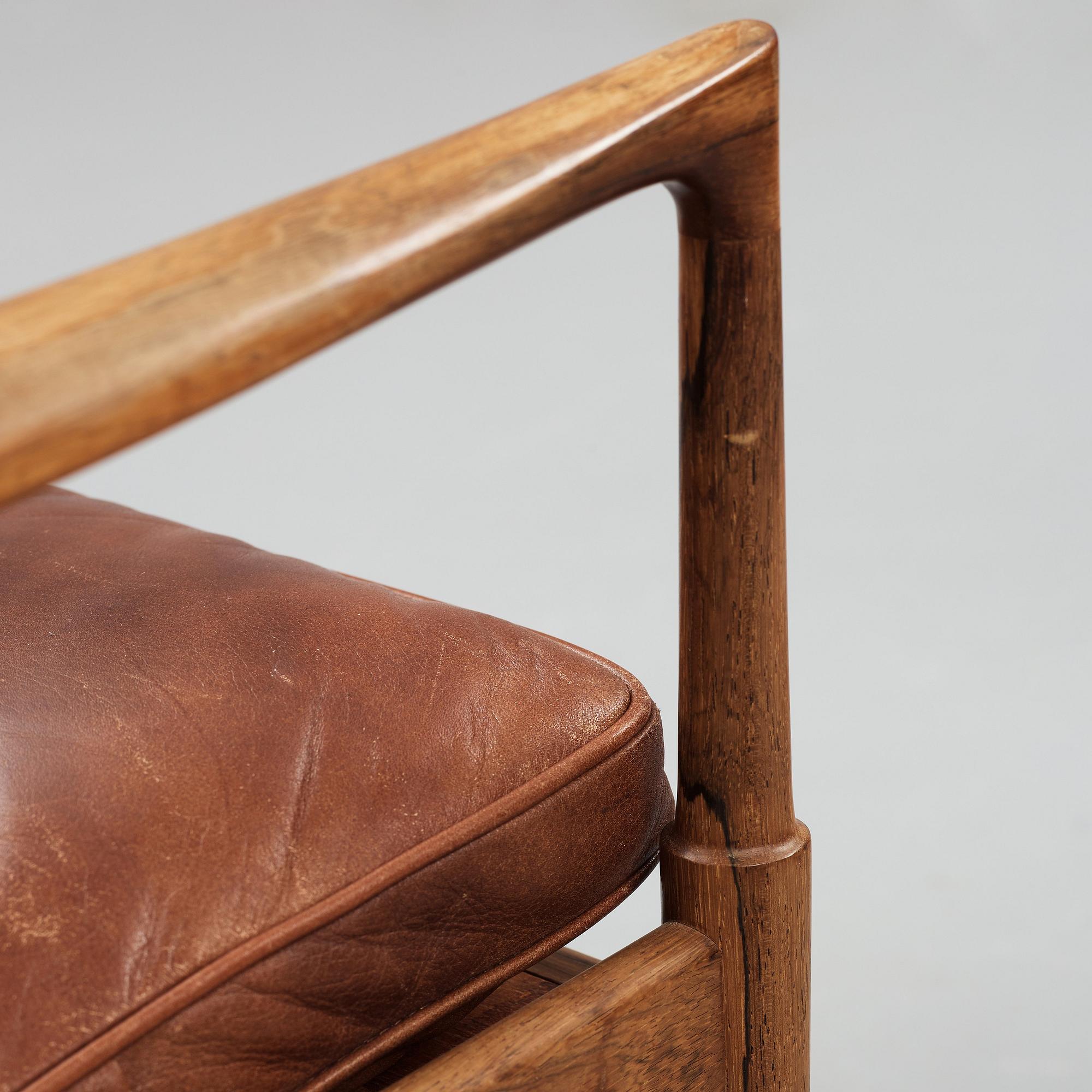 Ib Kofod-Larsen, a pair of "Samsö" palisander and brown leather easy chairs, Olof Persons Fåtöljindustri (OPE) Sweden 1960's.