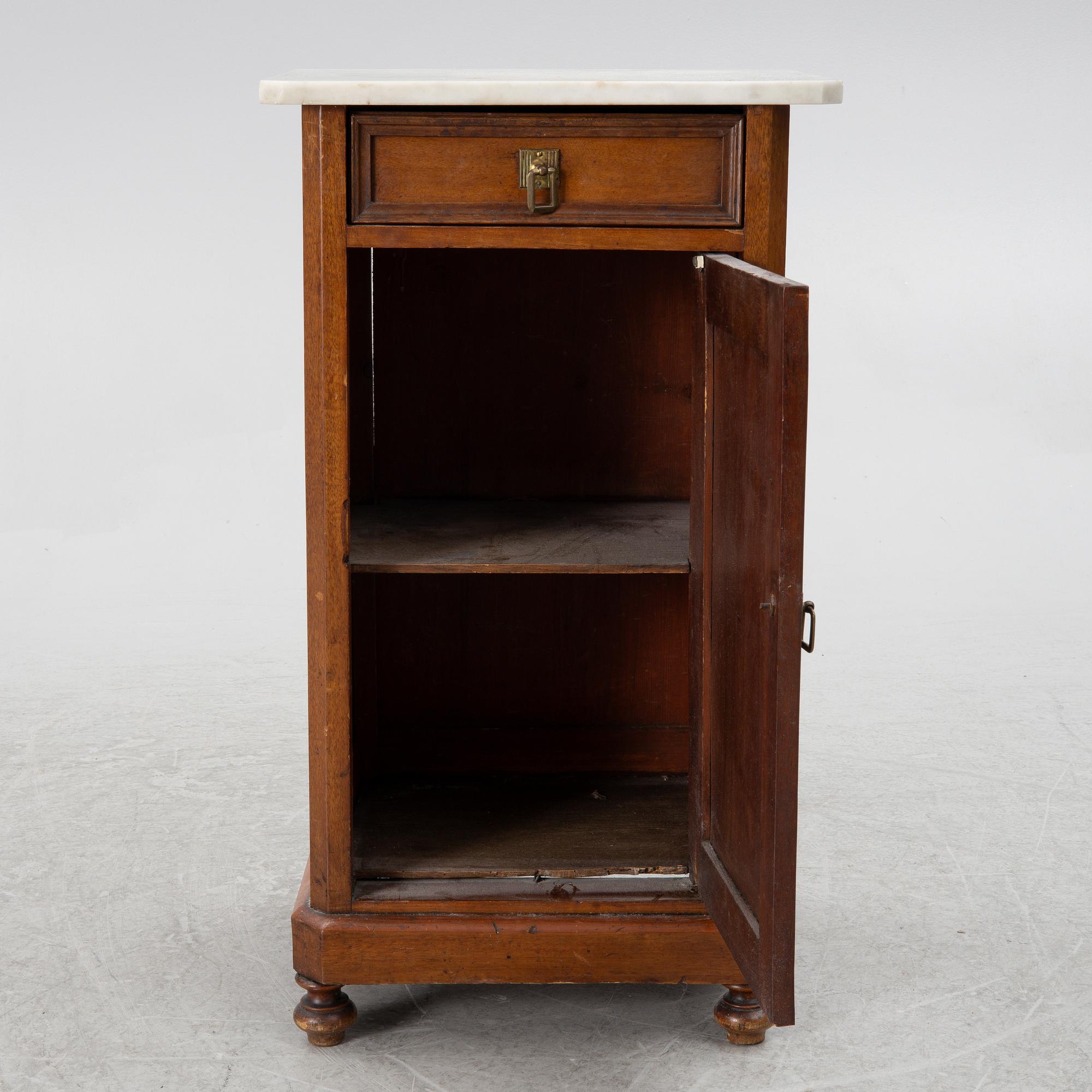A bedside table, circa 1900.