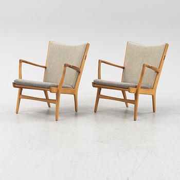 Hans J Wegner, a pair of model AP-16 armchairs, Denmark mid 20th century.