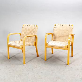 A set of two Alvar Aalto armchairs model 68, later part of the 20th century.