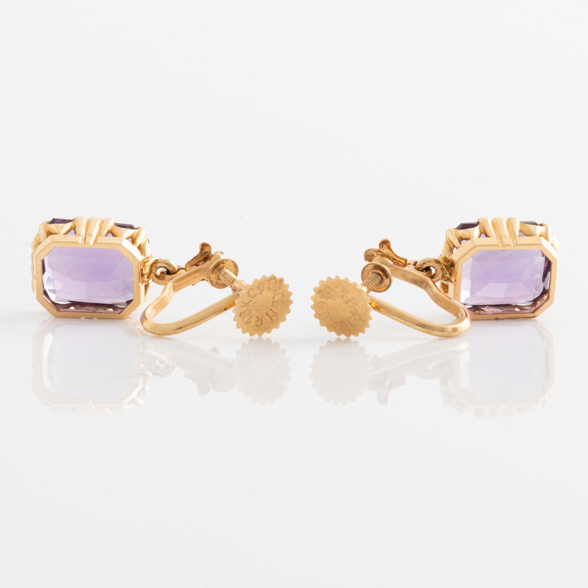 Örhängen ett par samt brosch guld med ametister.