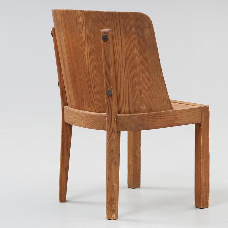 An Axel Einar Hjorth 'Lovö' stained pine armchair, Nordiska Kompaniet, Sweden 1930's.