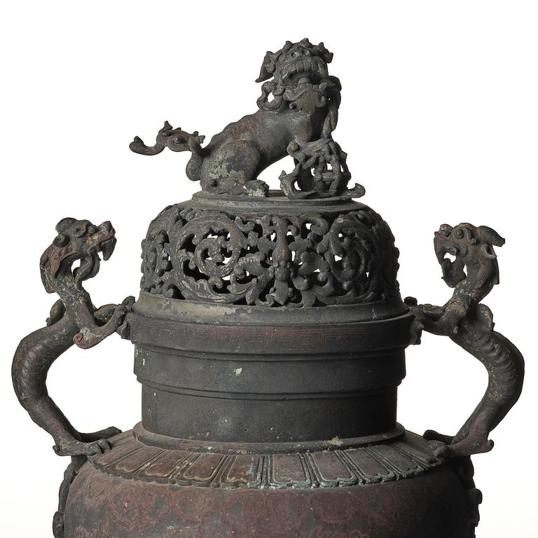 A large tripod bronze censer with pierced cover, late Ming/early Qing dynasty.