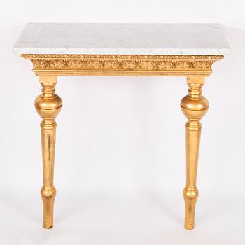 A mirror and a console table, around the year 1900.