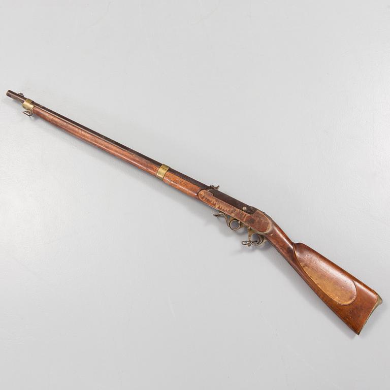 A mid 19th century PJ Malherbe & Cie A Liege rifle.