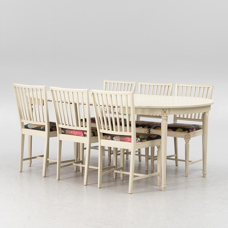 Dining table with six chairs, Gustavian style, second half of the 20th Century.