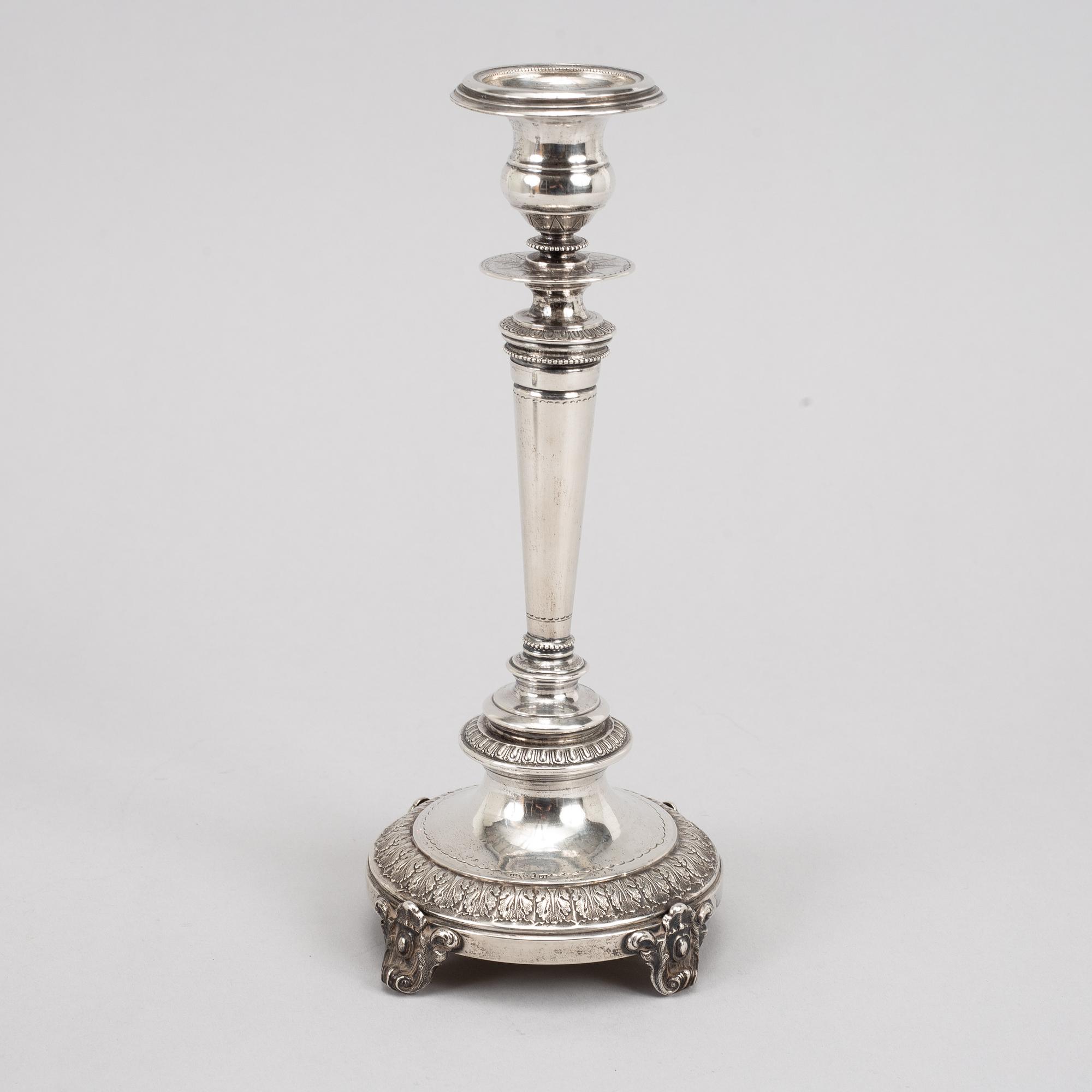 A pair of swedish silver candlesticks, mark of Guldsmedsaktiebolaget GAB, Stockholm 1882.