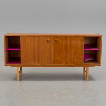 A 1960´s sideboard venereed in teak.