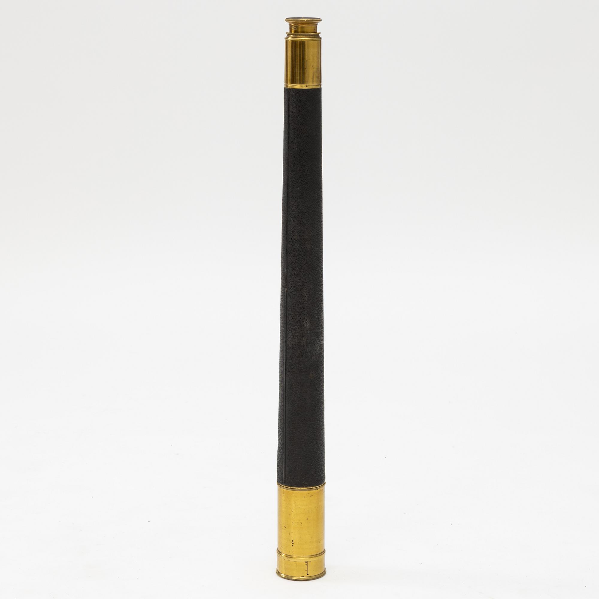A 20th century telescope on a tripod.