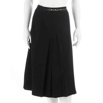 CÉLINE, a green wool skirt. Size 42.