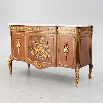 A chest of drawers, Louis XVI style, mid 20th Century.