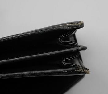 PORTFÖLJ, "Serviette conseiller ambassadeure Epi", Louis Vuitton.