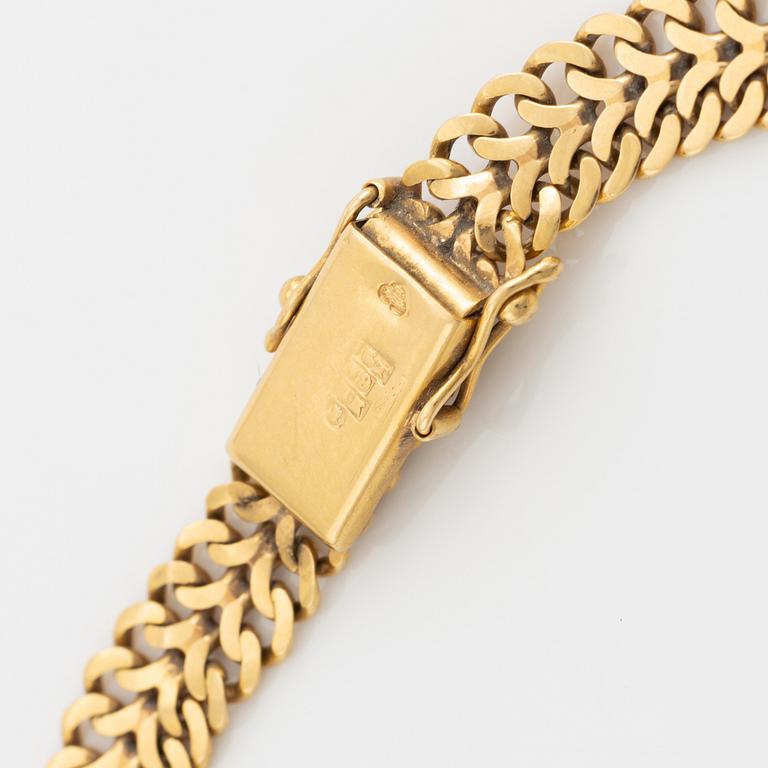 Armlänk, 18K guld.