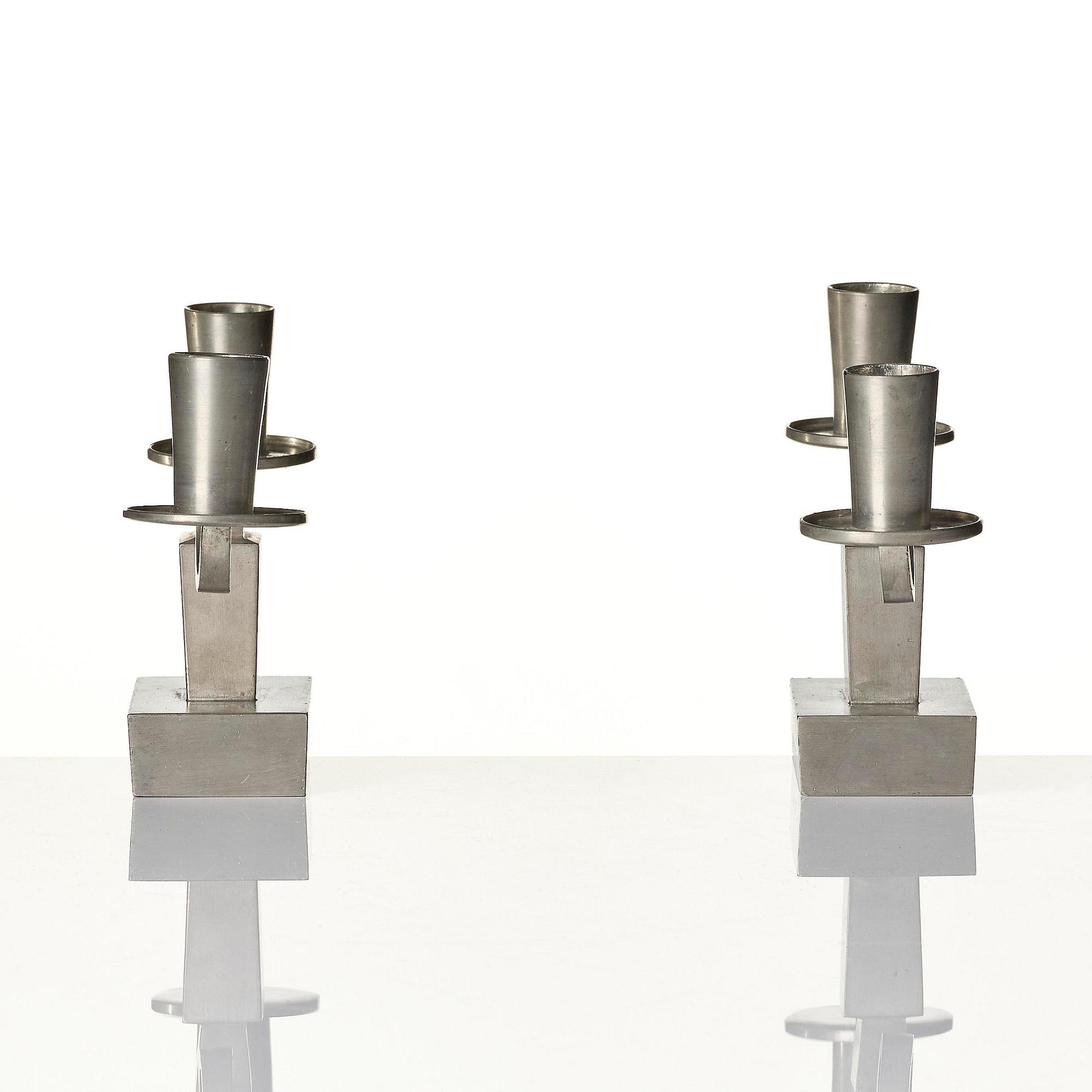Nils Fougstedt, a pair of pewter candelabra model "A 1047", Firma Svenskt Tenn, Stockholm 1932.
