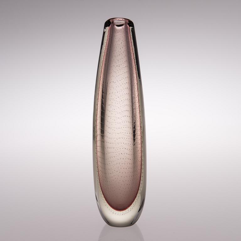 A glass vase signed G. Nyman.